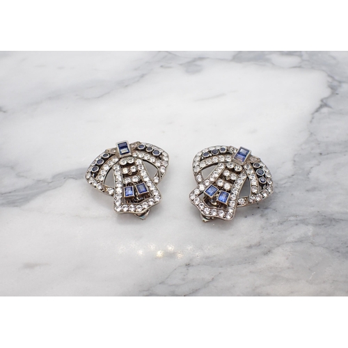 40 - A pair of Art Deco Clips millegrain-set baguette-cut sapphires and synthetic white brilliant-cut sto... 