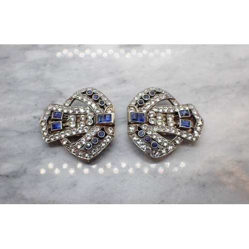 40 - A pair of Art Deco Clips millegrain-set baguette-cut sapphires and synthetic white brilliant-cut sto... 