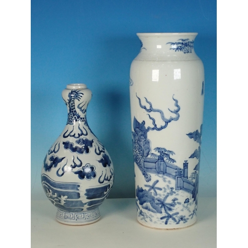 412 - A Chinese blue and white Vase, decorated dragons and trees in a landscape, 13in H, and a Chinese blu... 