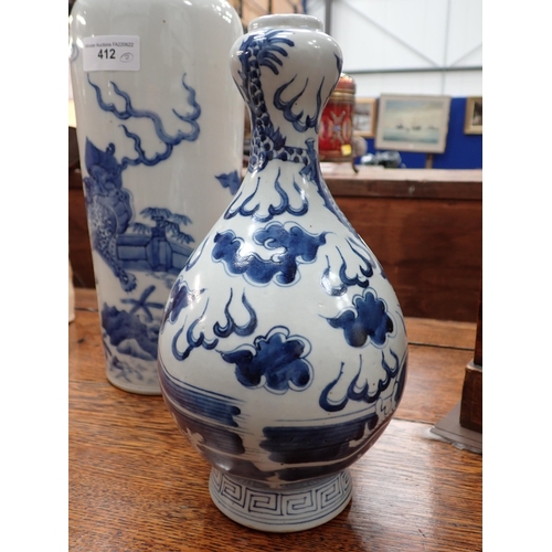 412 - A Chinese blue and white Vase, decorated dragons and trees in a landscape, 13in H, and a Chinese blu... 