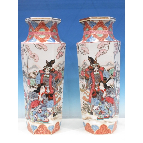 415 - A large pair of Oriental Vases of hexagonal form decorated flowering trees with gilt detail, 21in H