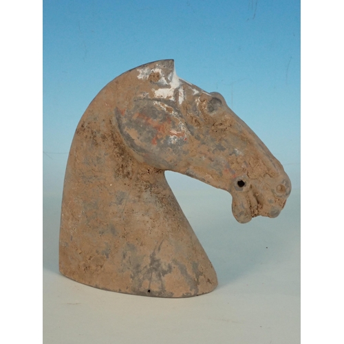 431 - A Han Dynasty burial Horses Head, 6in H, (chipped)