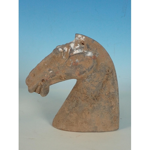 431 - A Han Dynasty burial Horses Head, 6in H, (chipped)