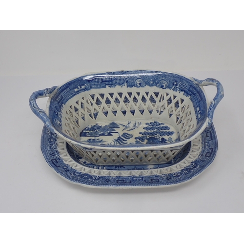 438 - A 19th Century blue and white Willow pattern Chestnut Basket and Stand with pierced lattice design, ... 