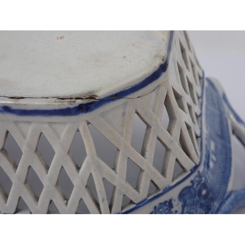 438 - A 19th Century blue and white Willow pattern Chestnut Basket and Stand with pierced lattice design, ... 