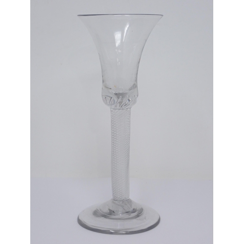 443 - A Georgian Wine Glass with trumpet-shaped bowl and spiral twist stem, domed foot, 6¼ in H