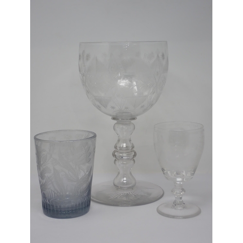 455 - A mammoth cut glass Goblet engraved panel of flowers, stars and geometric tapering line decoration o... 