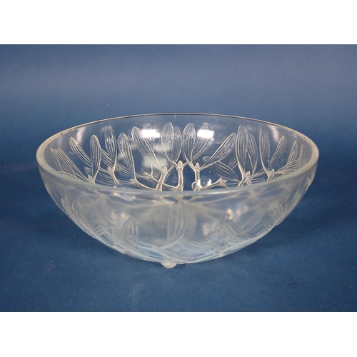 458 - An R. Lalique circular glass Bowl with mistletoe design, interior surface scratched, 8in Diam