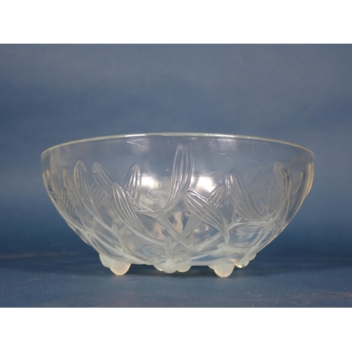 458 - An R. Lalique circular glass Bowl with mistletoe design, interior surface scratched, 8in Diam