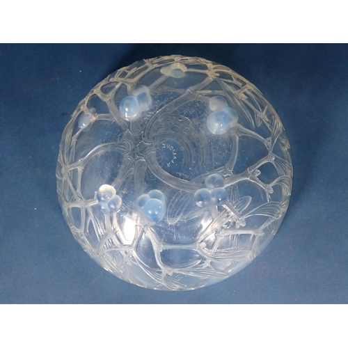 458 - An R. Lalique circular glass Bowl with mistletoe design, interior surface scratched, 8in Diam