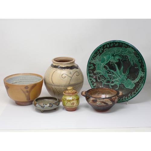 478 - Six pieces of Studio Pottery including a green glazed Plate with octopus and sea serpent design, an ... 