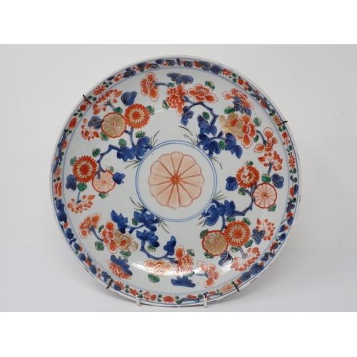 482 - An Imari circular Charger with figure of bird in a landscape, 14in, and another with stylised floral... 