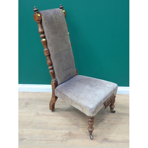 483 - A Victorian mahogany framed Prayer Chair with turned uprights and lavender upholstery