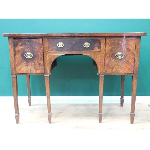 486 - A Georgian mahogany Serpentine Sideboard with crossbanded top and frieze, and two deep drawers raise... 