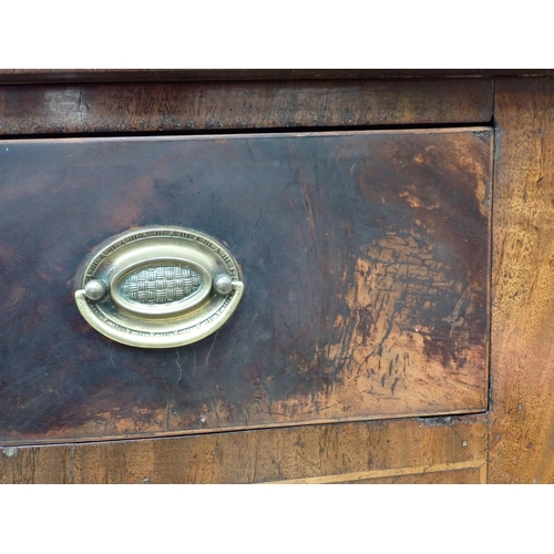 486 - A Georgian mahogany Serpentine Sideboard with crossbanded top and frieze, and two deep drawers raise... 