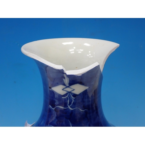 399 - A blue and white baluster Vase, A/F, and a small Celadon glazed octagonal Bowl