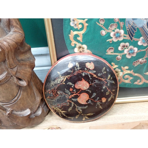 701 - A carved wood Figure of a Buddha, 14in H, lacquered Panels and a dish and a framed Panel