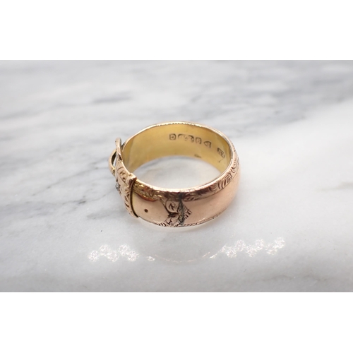 162 - An Edwardian buckle Ring with engraved borders and pavé-set single old-cut diamond in 9ct gold, ring... 