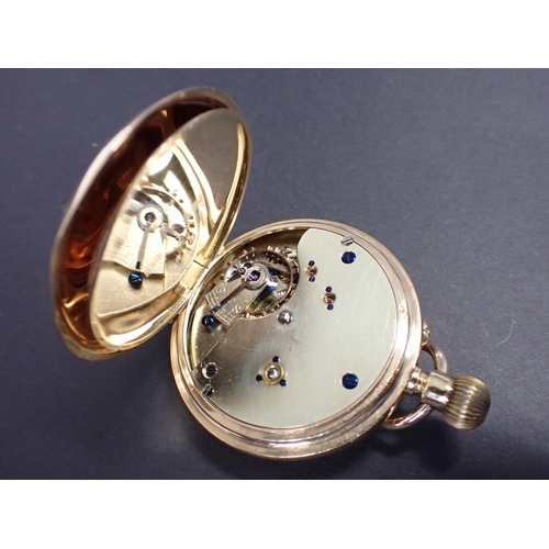 164 - A Continental 18ct gold cased keyless wind half hunter Pocket Watch the white enamel dial with roman... 