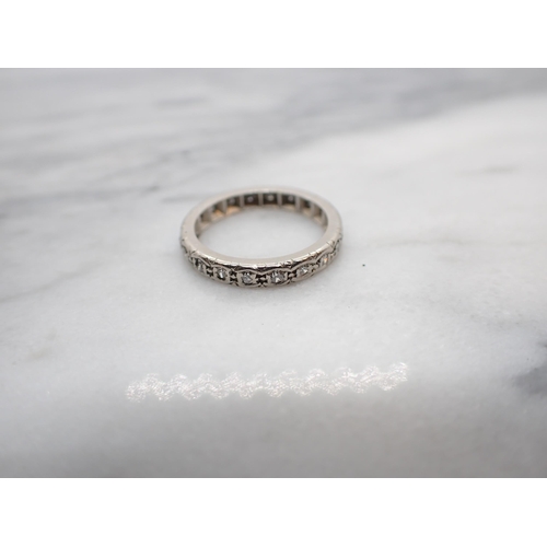 167 - A Diamond Eternity Ring illusion-set eight-cut stones, ring size I 1/2