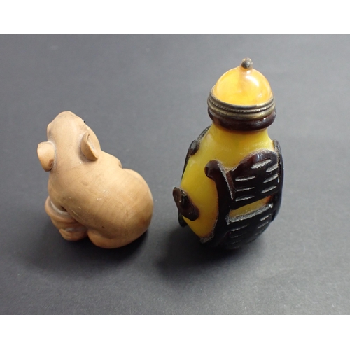 178 - A carved wooden Netsuke in the form of a mouse, 1 3/4in and a yellow carved stone Snuff Bottle, 2 1/... 