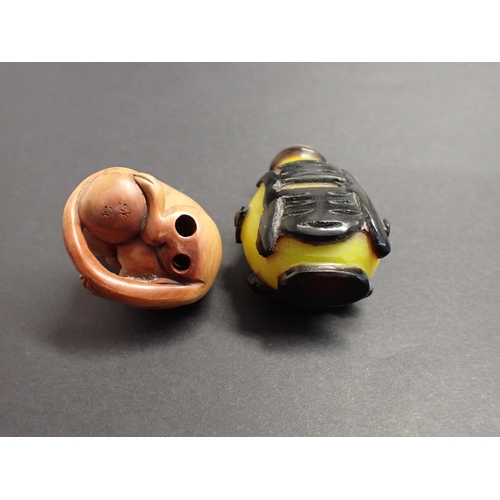 178 - A carved wooden Netsuke in the form of a mouse, 1 3/4in and a yellow carved stone Snuff Bottle, 2 1/... 