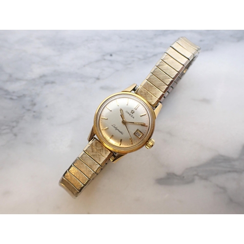 181 - An Omega Ladymatic Wristwatch the silvered dial with hourly baton markers, sweep seconds hand and da... 