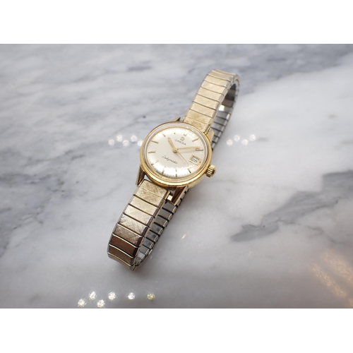 181 - An Omega Ladymatic Wristwatch the silvered dial with hourly baton markers, sweep seconds hand and da... 