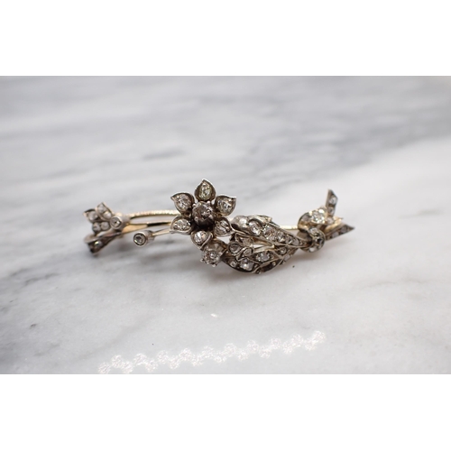 185 - A Diamond flower spray Brooch set throughout with old and rose-cut stones