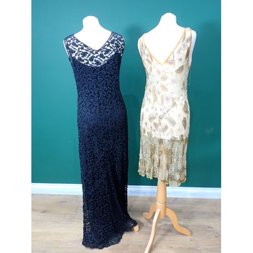 200 - A 1920's gold coloured beaded Dress A/F and a 1930's black lace Dress