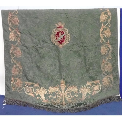 201 - A 19th Century green damask Wall Hanging with appliquéd heraldic crest within borders of scrolls, co... 