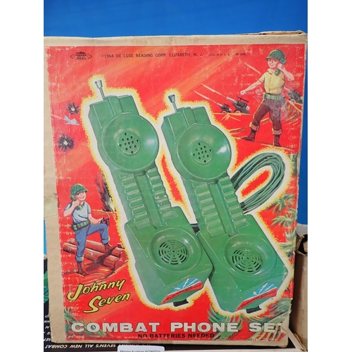 21 - A boxed Jonny Seven Microhelmet Phone Set (box damaged). a boxed Combat Phone Set and a boxed Moon P... 