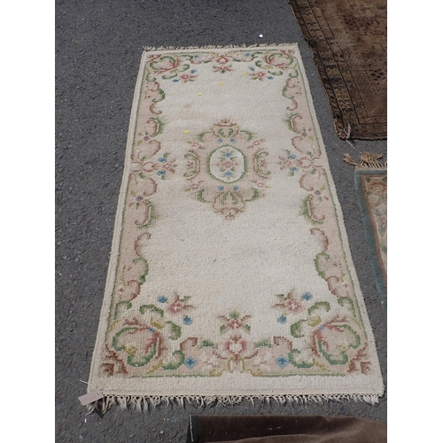 275 - A North African beige ground Rug with geometric design 7ft 8in L x 5ft W, two antique Persian Rugs, ... 