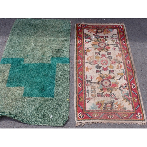 275 - A North African beige ground Rug with geometric design 7ft 8in L x 5ft W, two antique Persian Rugs, ... 