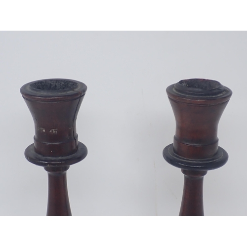 314 - A pair of Arts and Crafts mahogany turned Candlesticks on octagonal laburnum and bone inlaid bases 1... 