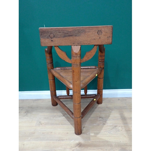 328 - An ash and oak Turned Chair in the 17th Century style with bobbin turned arms and ring turned suppor... 