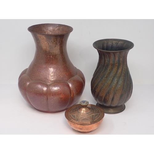 338 - Two hammered copper Vases, an Arts and Crafts copper Kettle and a lidded Bowl