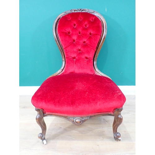 347 - A Victorian Nursing Chair with button upholstered spoon back