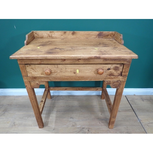 353 - A pine Washstand with low raised back, fitted frieze drawer on squared supports and stretchers, 2ft ... 