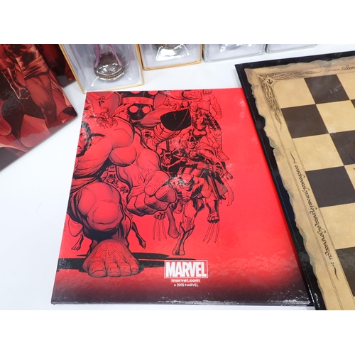 36 - Fifteen boxed Marvel Collector's Figures and Chess Boards