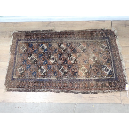 370 - A bordered Persian Rug with floral designs on a red ground, worn, 6ft 3in and a small Persian Rug, w... 