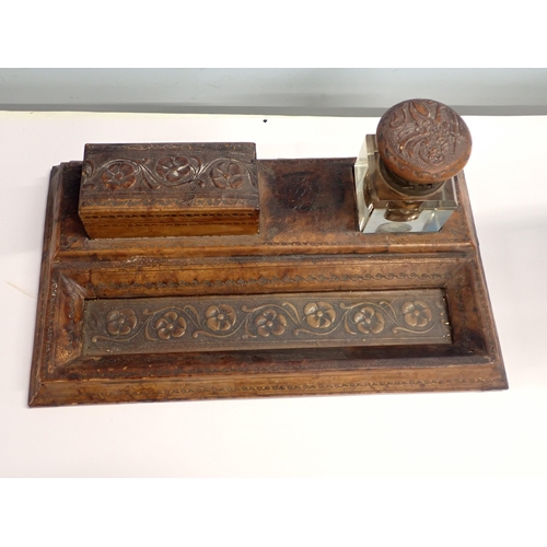 377 - A leather covered Desk Stand, Blotter and Letter rack, all with tooled flower design