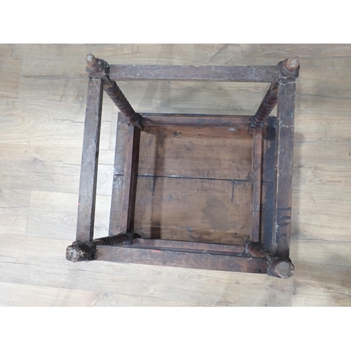 405 - A 17th Century oak  Side Table with moulded two plank lid on bobbin turned supports united by surrou... 