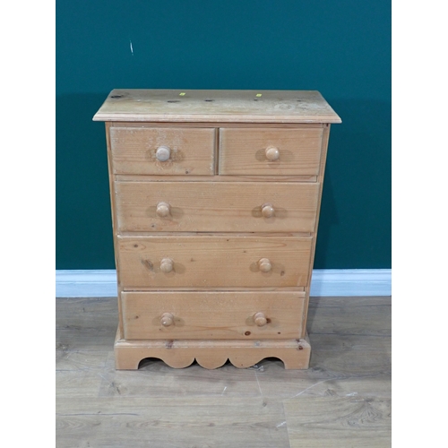 409 - A small pine Chest of two short and three long drawers 2ft 7in H x 1ft 11in W