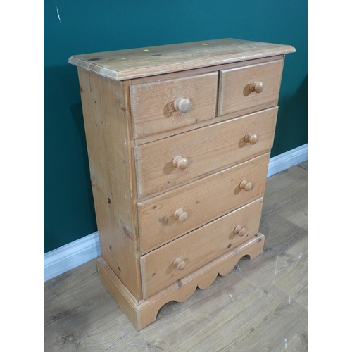 409 - A small pine Chest of two short and three long drawers 2ft 7in H x 1ft 11in W