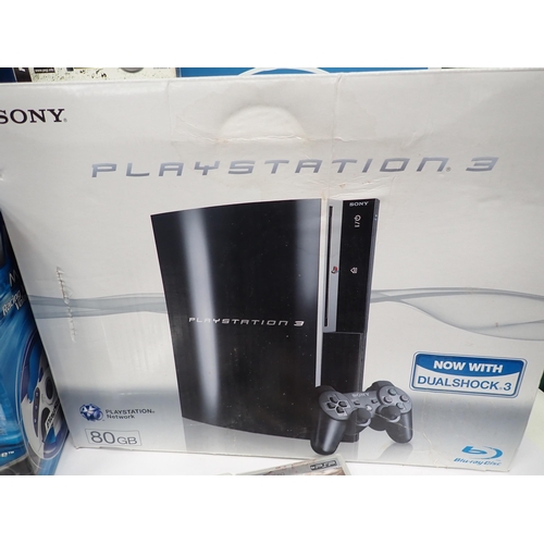 42 - A boxed Sony Playstation 3 with Accessories and Games