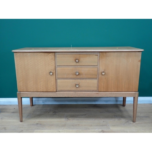 455 - A Gordon Russell teak Sideboard fitted pair of cupboard doors flanking three drawers 4ft 8in W x 2ft... 