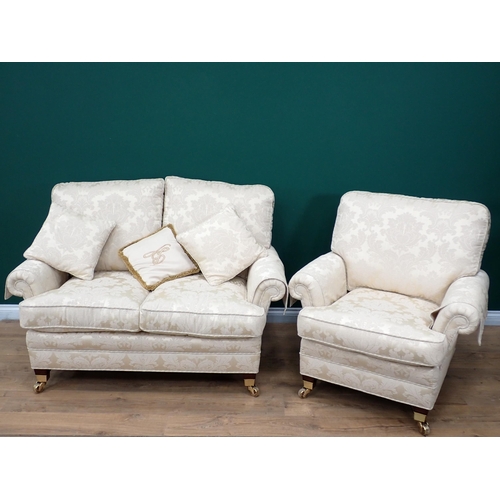 456 - A modern cream upholstered three piece Suite, consisting of a three seater Sofa 6ft 8in W x 3ft H, a... 