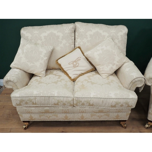 456 - A modern cream upholstered three piece Suite, consisting of a three seater Sofa 6ft 8in W x 3ft H, a... 