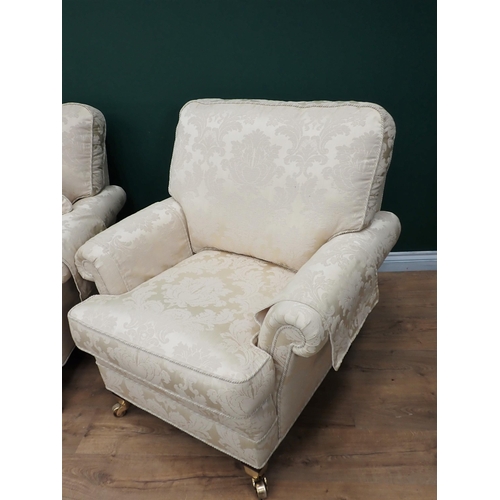 456 - A modern cream upholstered three piece Suite, consisting of a three seater Sofa 6ft 8in W x 3ft H, a... 